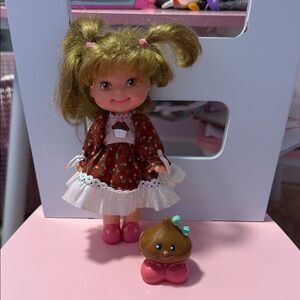 4 Vintage Mattel Strawberry Shortcake Dolls in Dresses shown